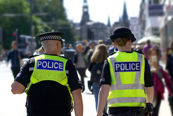 The back of two police officers